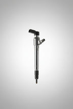 A single automotive fuel injector or similar metal mechanical part with black plastic fittings, photographed on a brushed stainless steel surface.